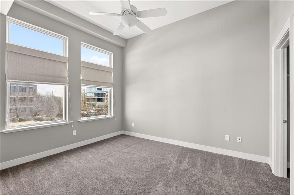 201 West Ponce De Leon Avenue, Unit 702 Decatur, GA 30030 - Photo 26 of 41 an empty room with a window