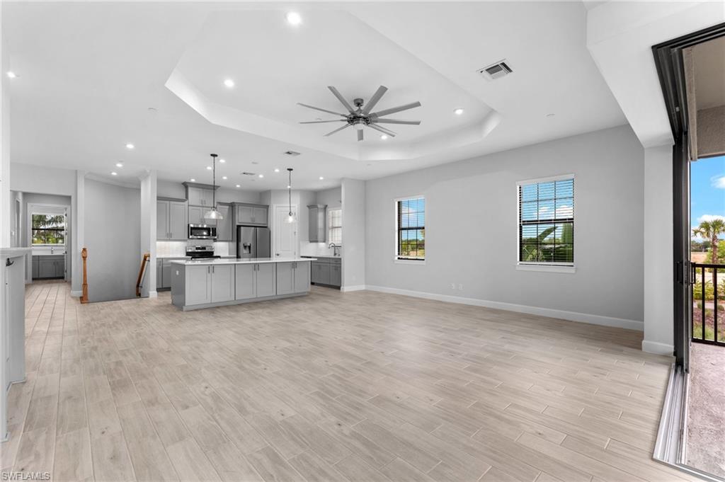 15244 Zeno Way, Unit 201 Naples, FL 34114 - Photo 23 of 50 a view of a kitchen with a sink and a window