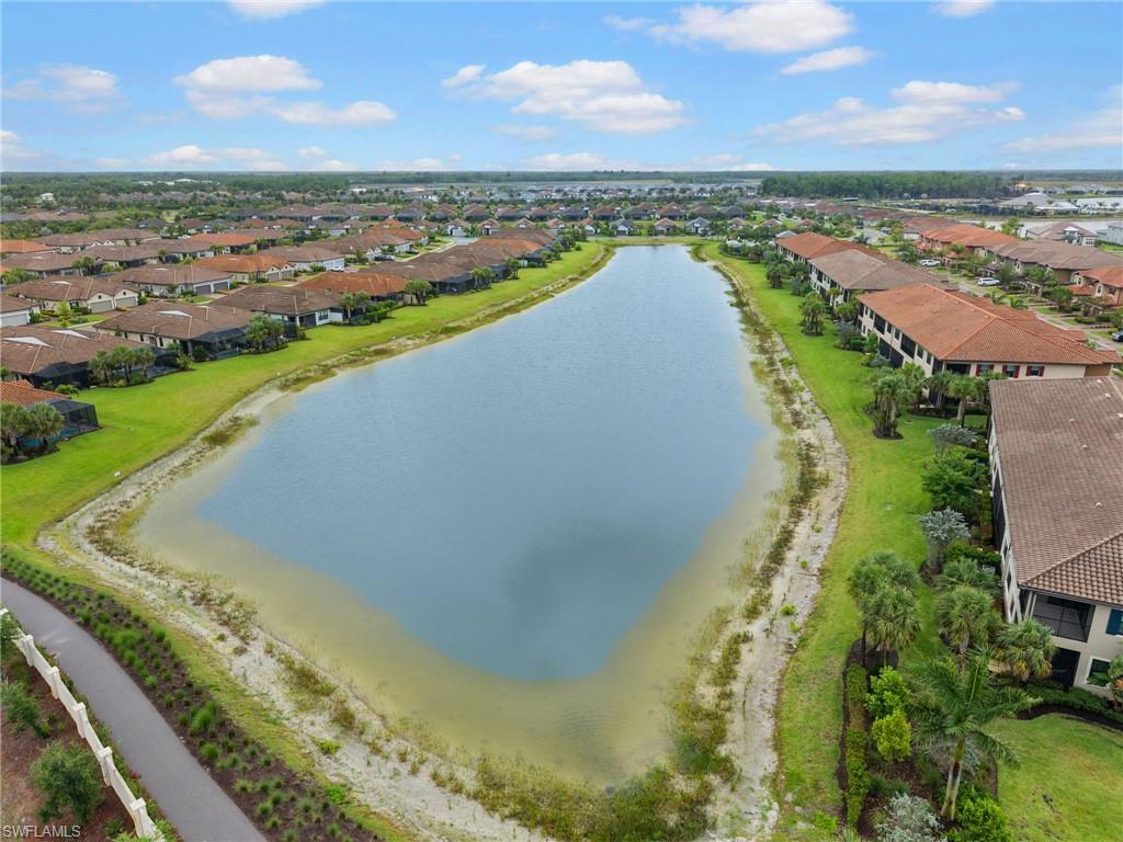 15244 Zeno Way, Unit 201 Naples, FL 34114 - Photo 9 of 50 a view of a city and an ocean