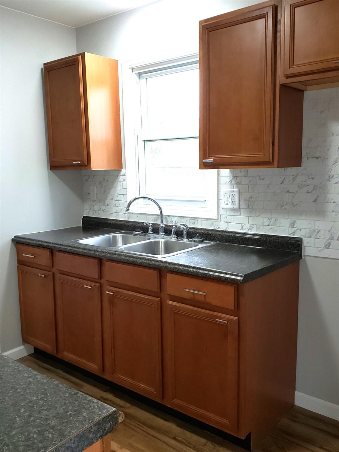 734 Governor Road Valparaiso, IN 46385 - Photo 8 of 15 a kitchen with sink and cabinets
