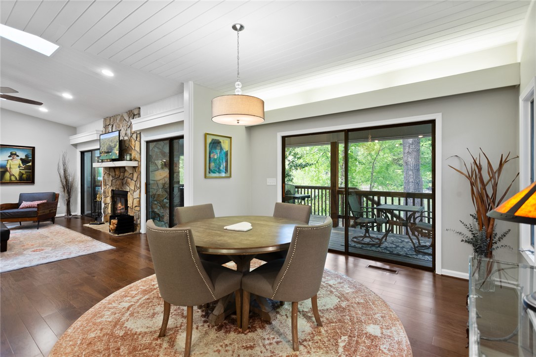 5 High Tide Court Salem, SC 29676 - Photo 11 of 40 This living space offers seamless indoor-outdoor living with a deck and warm wood floors.