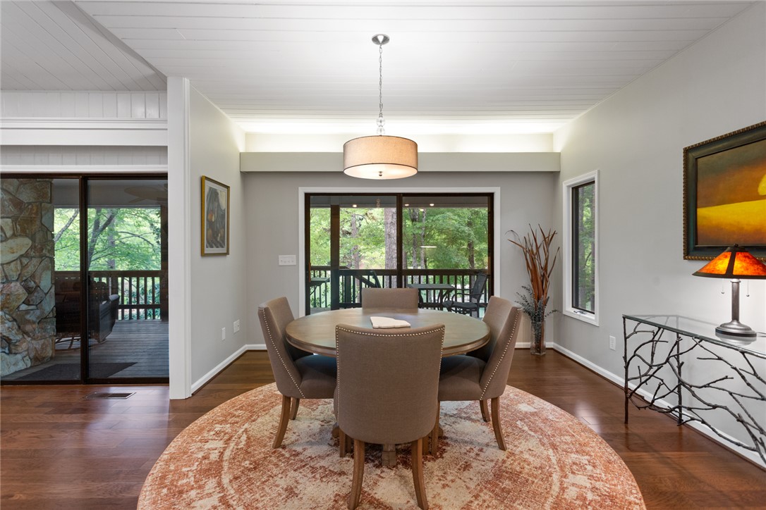 5 High Tide Court Salem, SC 29676 - Photo 13 of 40 This dining area with hardwood floors offers seamless access to an outdoor deck.
