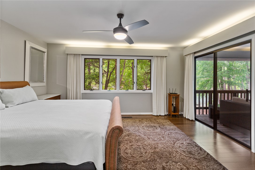 5 High Tide Court Salem, SC 29676 - Photo 14 of 40 This peaceful bedroom offers ample natural light and a private balcony overlooking Lake Keowee