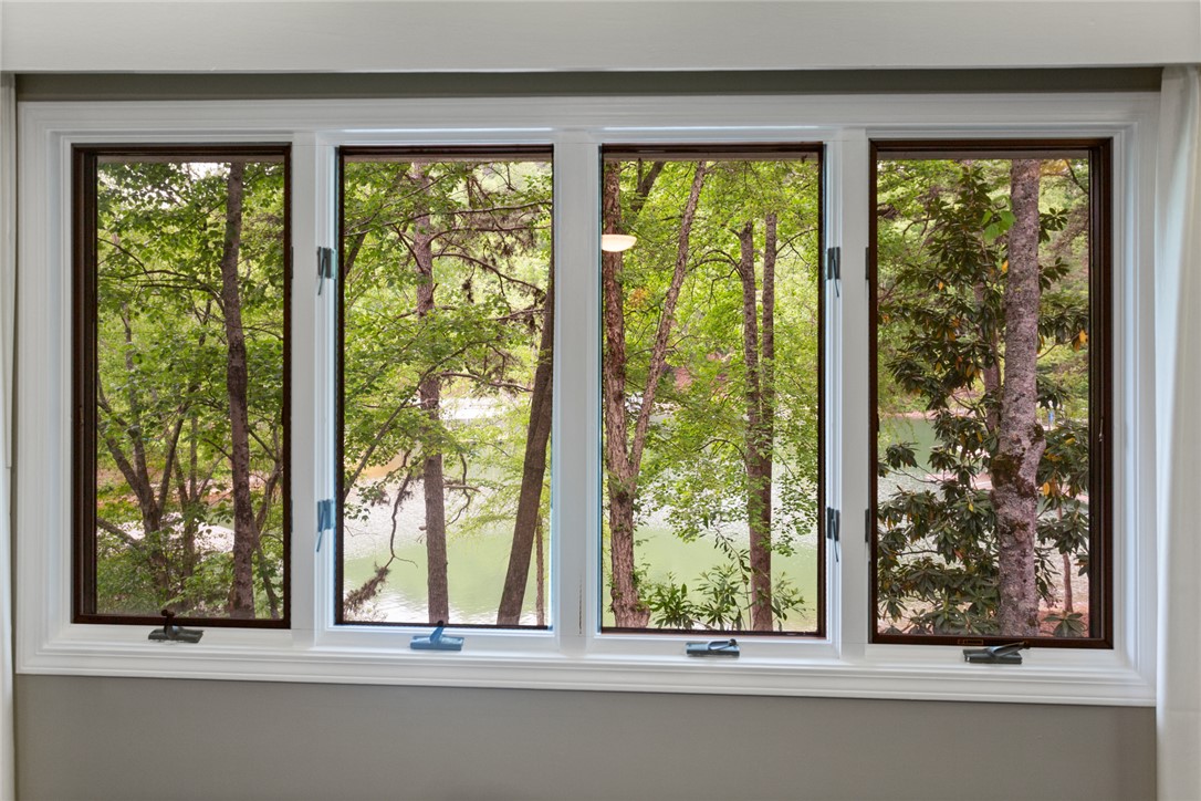 5 High Tide Court Salem, SC 29676 - Photo 15 of 40 These windows frame a tranquil view of lush trees on Lake Keowee