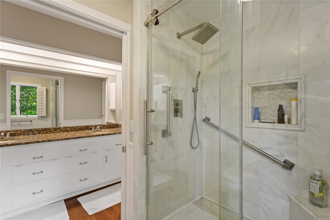 5 High Tide Court Salem, SC 29676 - Photo 17 of 40 This spacious bathroom offers a double vanity and a glass-enclosed shower.