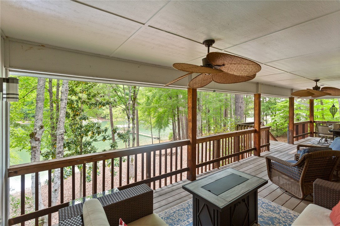5 High Tide Court Salem, SC 29676 - Photo 26 of 40 This inviting porch offers tranquil views of the surrounding lake and lush greenery.