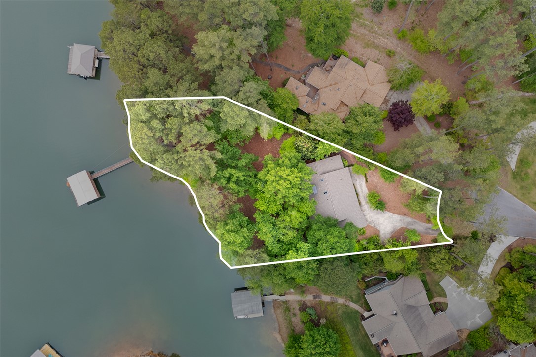 5 High Tide Court Salem, SC 29676 - Photo 30 of 40 This serene lakefront property offers privacy and direct water access, ideal for tranquil living.