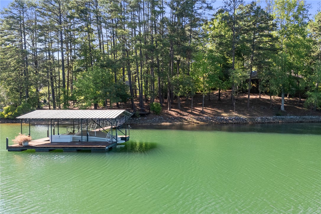 5 High Tide Court Salem, SC 29676 - Photo 33 of 40 This serene waterfront property offers direct access to the lake with a private boat dock.