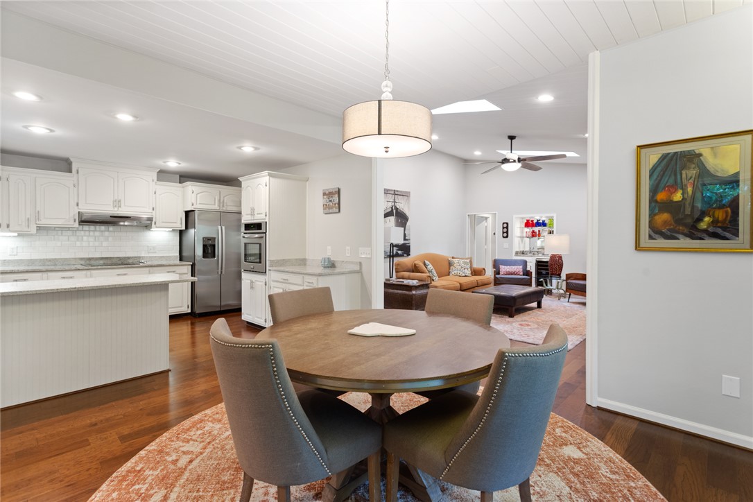 5 High Tide Court Salem, SC 29676 - Photo 10 of 40 This open concept space features a kitchen with modern appliances, a dining area, and a living room.