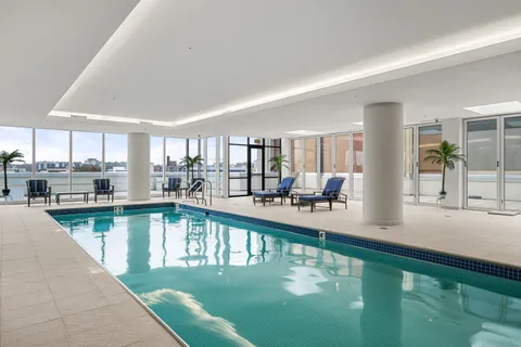 a view of a terrace with furniture and a kitchen