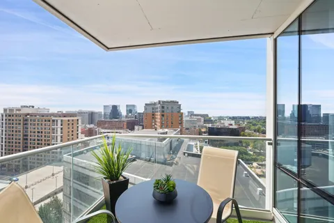 a view of a balcony with city view