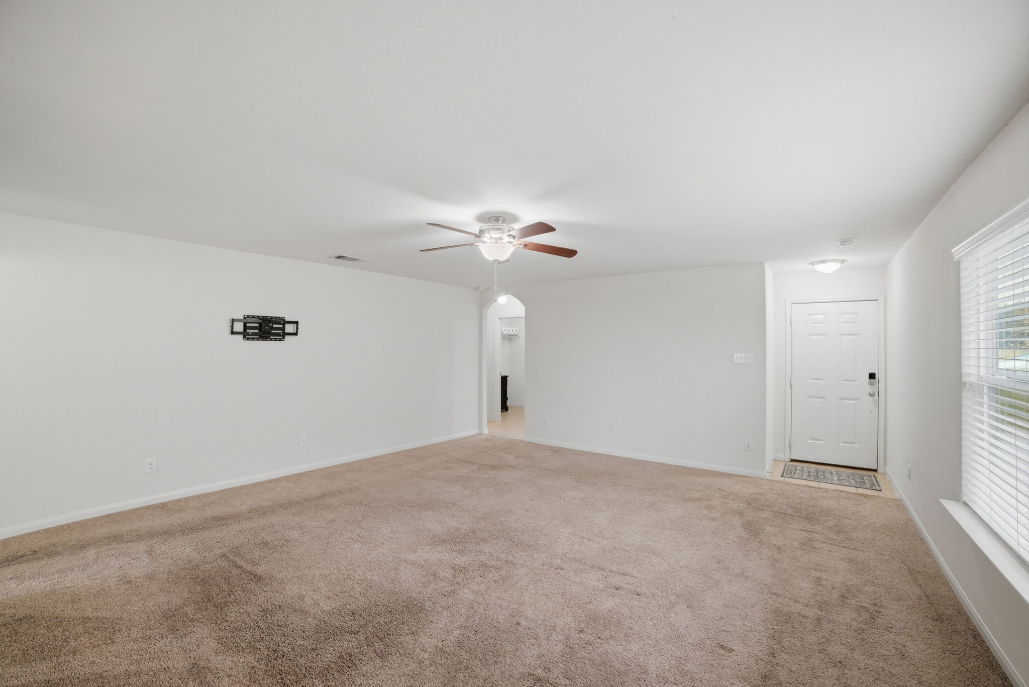 107 Millers Loop Jarrell, TX 76537 - Photo 11 of 31 a view of a big room with carpet
