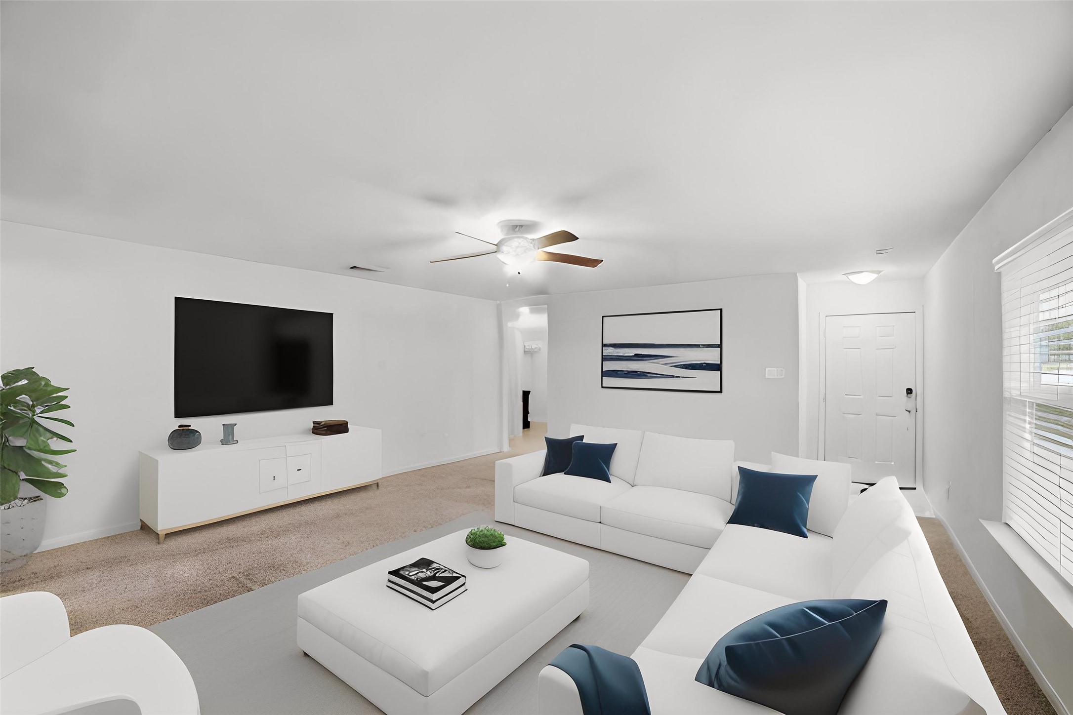 107 Millers Loop Jarrell, TX 76537 - Photo 13 of 31 a living room with furniture and a flat screen tv