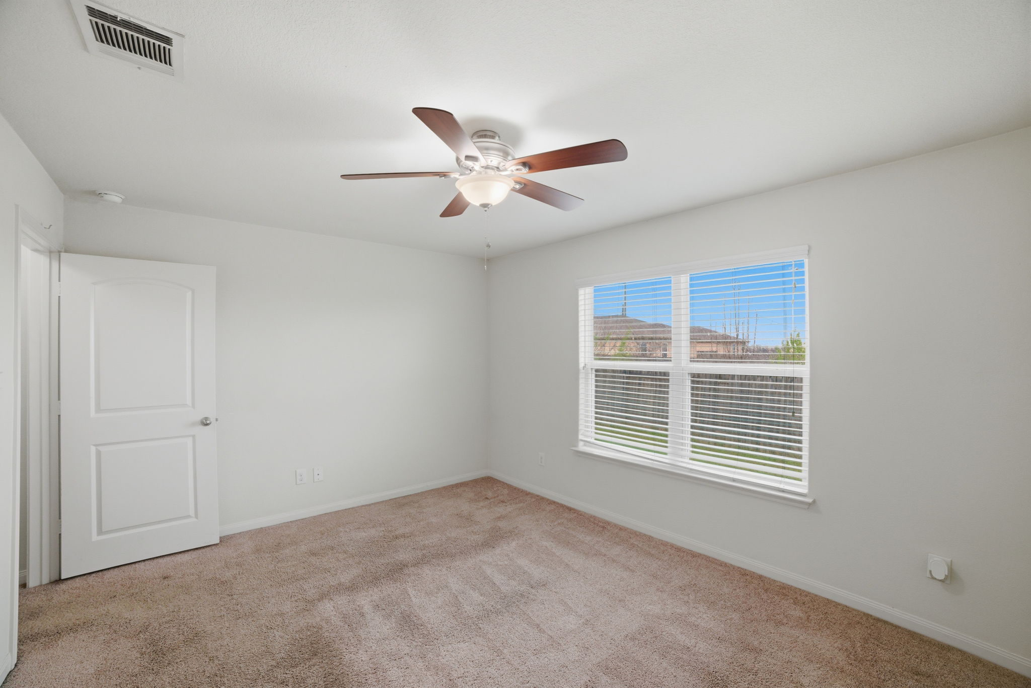107 Millers Loop Jarrell, TX 76537 - Photo 22 of 31 a view of an empty room with a window