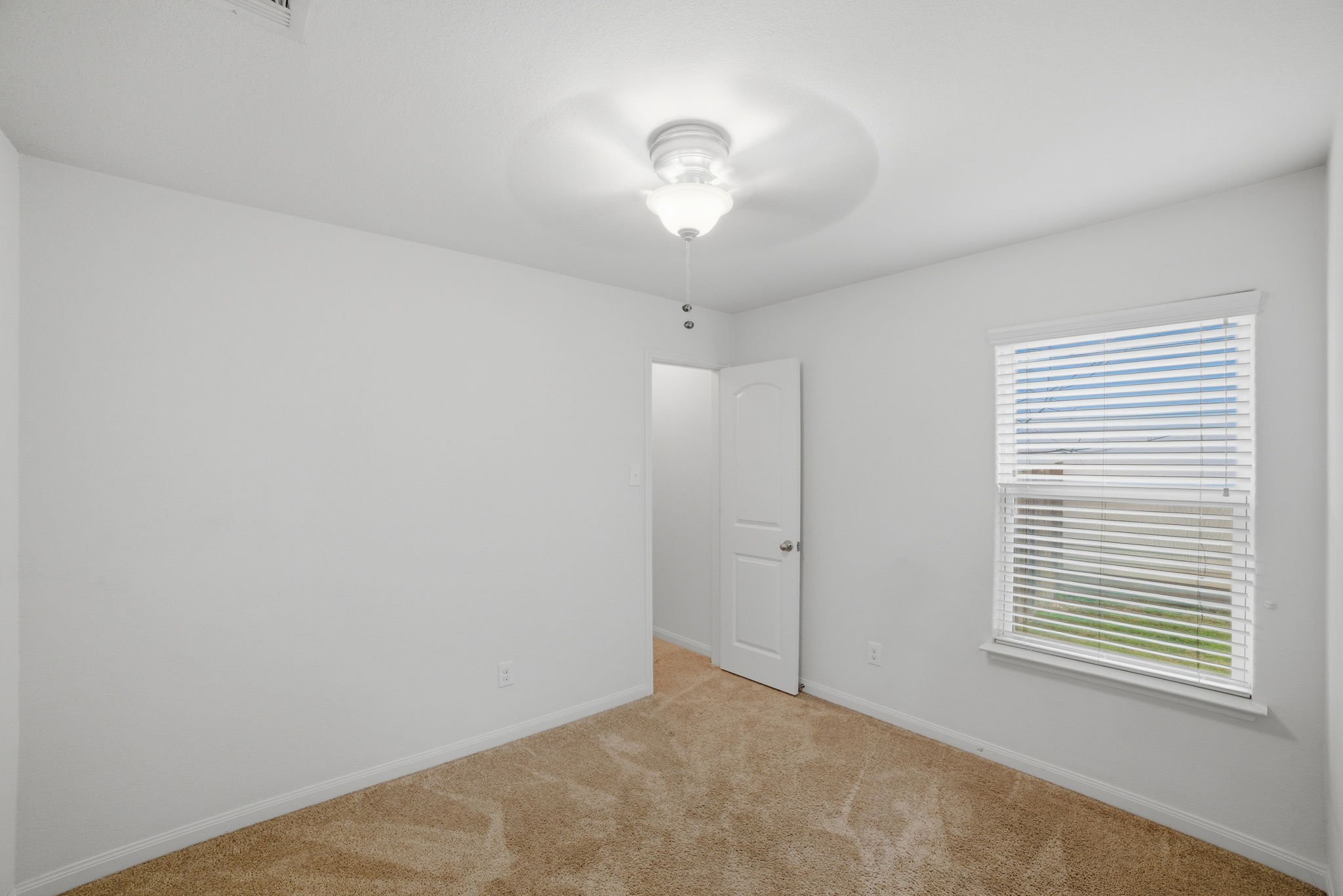 107 Millers Loop Jarrell, TX 76537 - Photo 26 of 31 a view of an empty room with a window