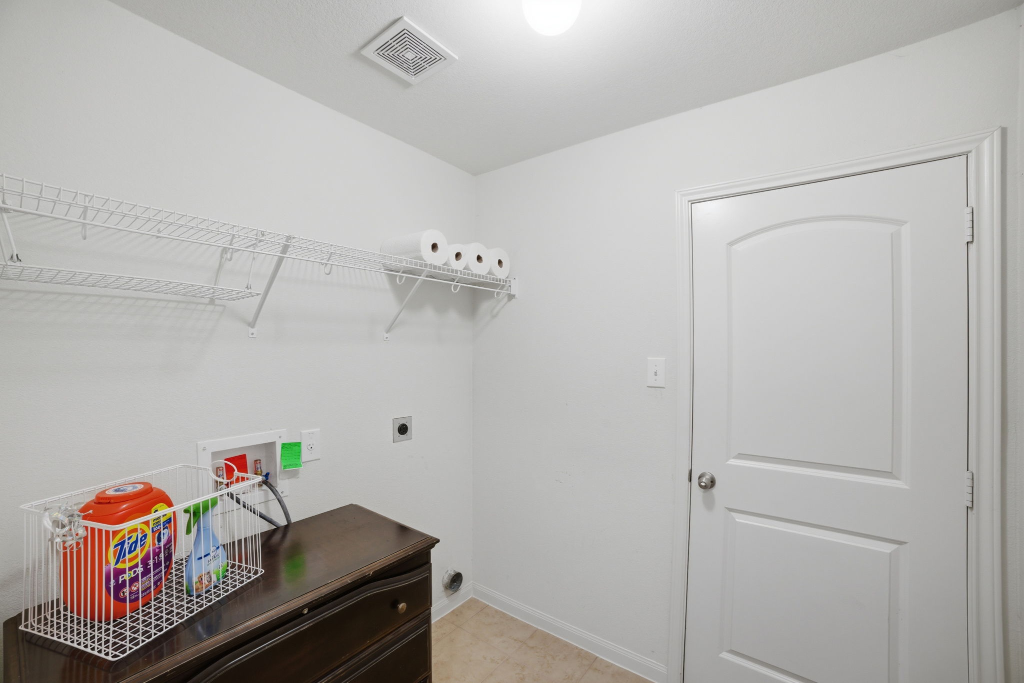 107 Millers Loop Jarrell, TX 76537 - Photo 28 of 31 a room with storage and utility racks