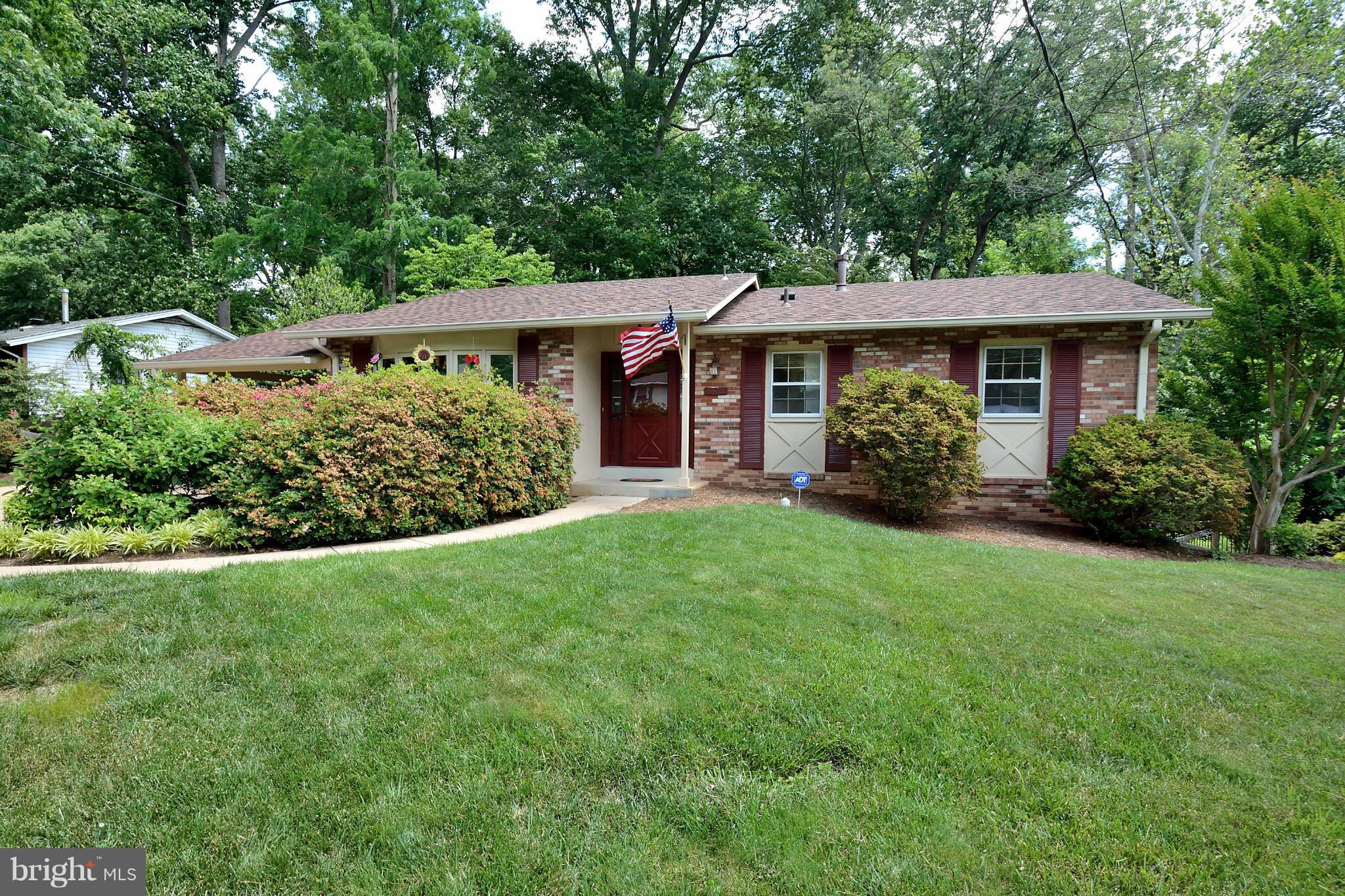 5613 Ravenel Lane Springfield, VA 22151 - Photo 1 of 30 front view of a house with a yard