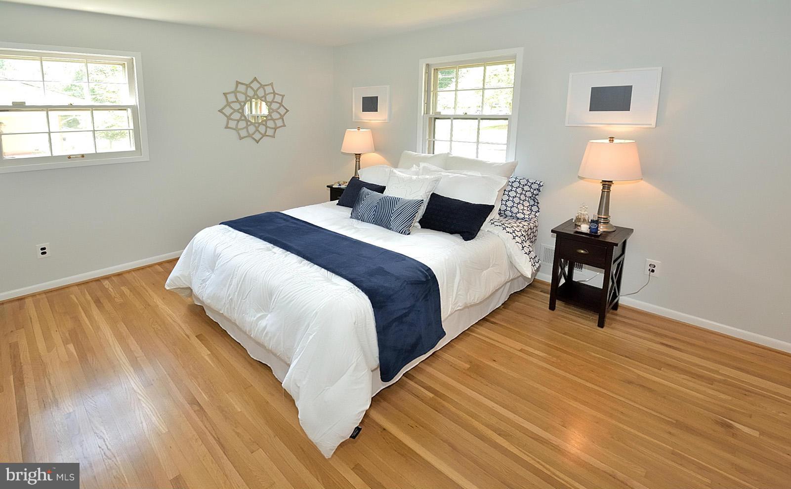 5613 Ravenel Lane Springfield, VA 22151 - Photo 14 of 30 a bedroom with a bed and a window
