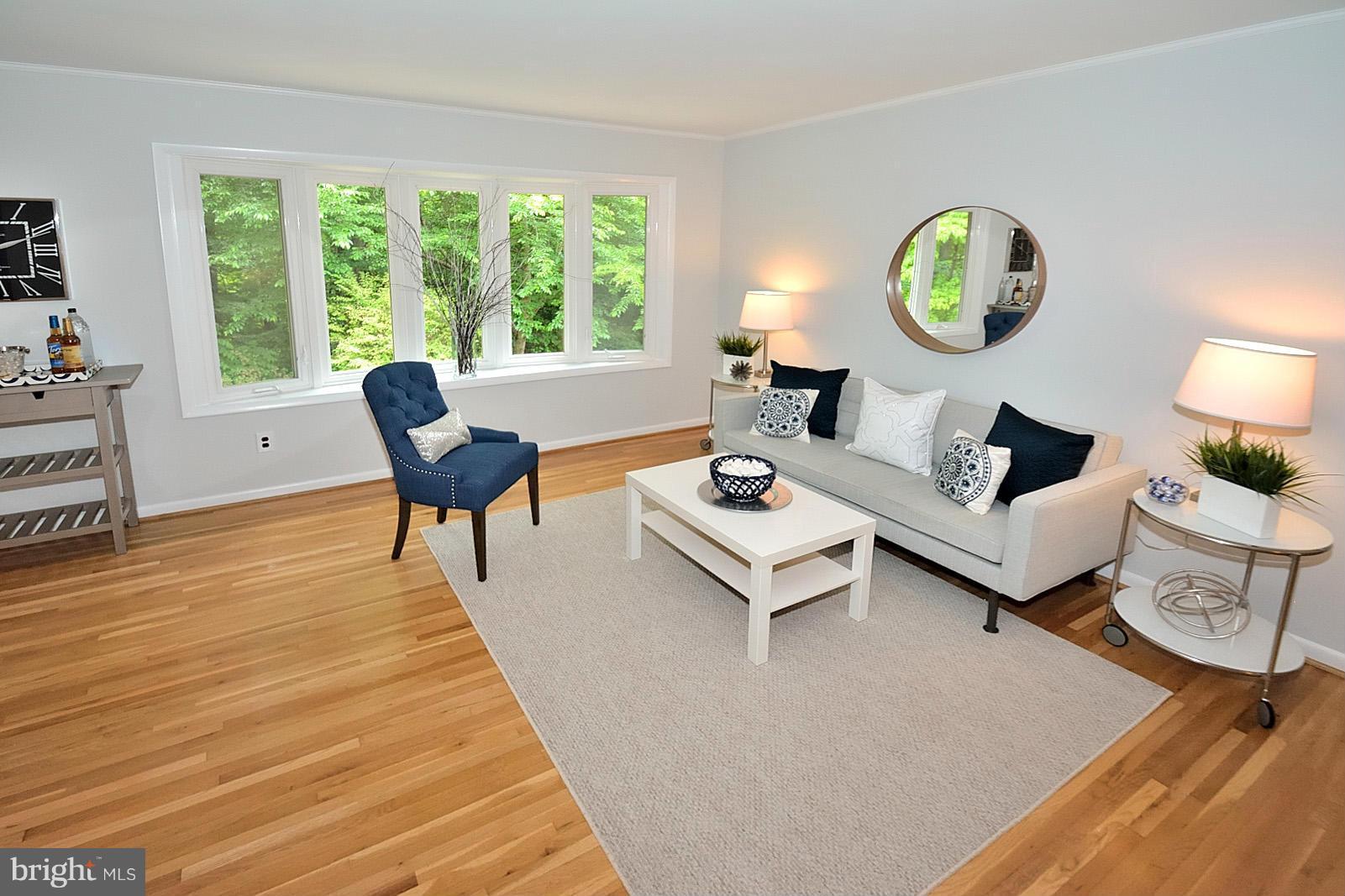 5613 Ravenel Lane Springfield, VA 22151 - Photo 4 of 30 a living room with furniture and a large window