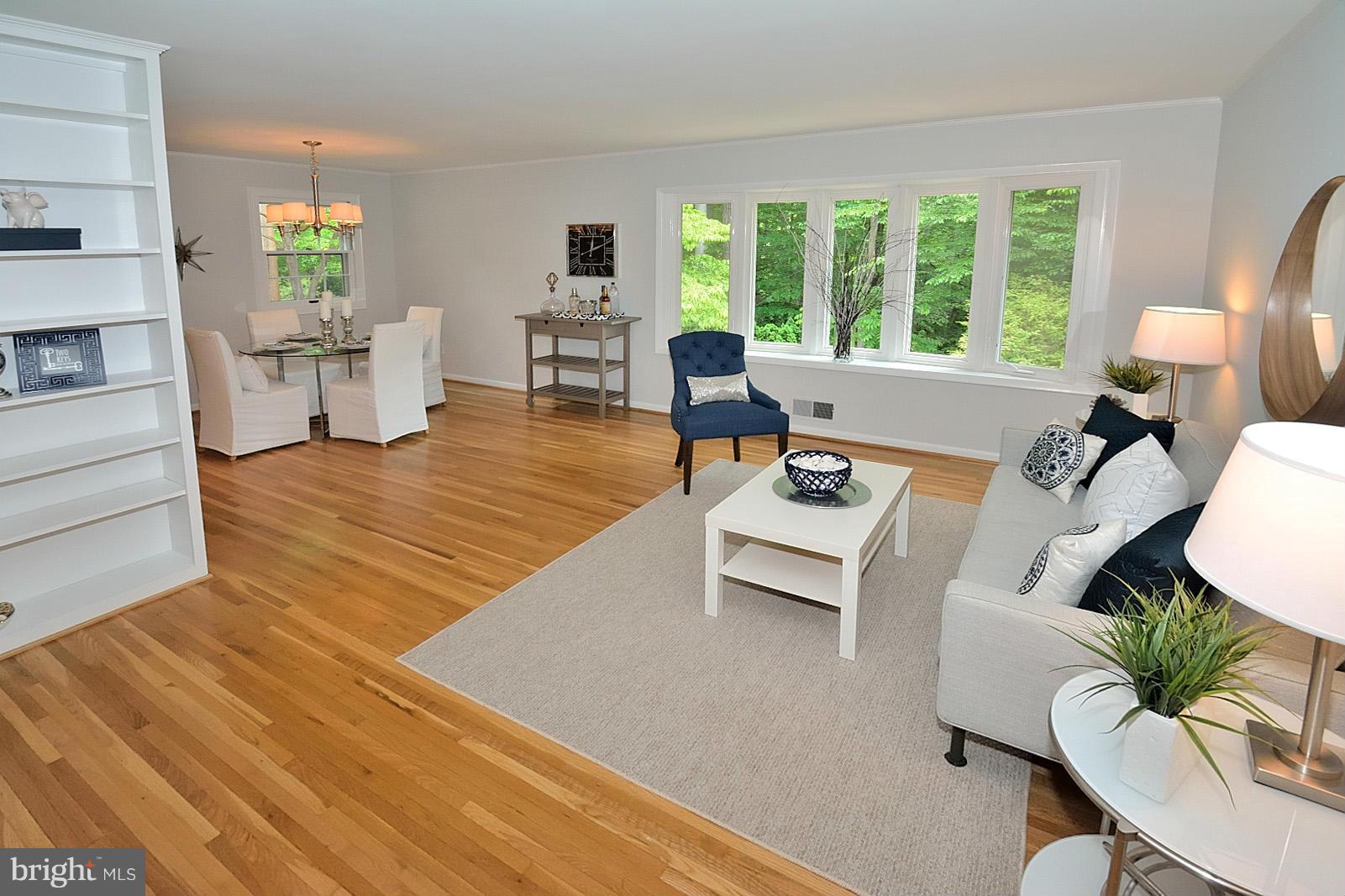 5613 Ravenel Lane Springfield, VA 22151 - Photo 5 of 30 a living room with furniture and large windows