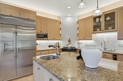 a view of balcony with floor and wooden fence