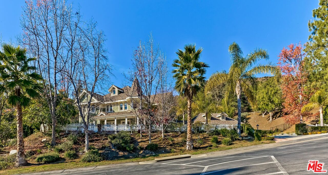 front view of a house with a street