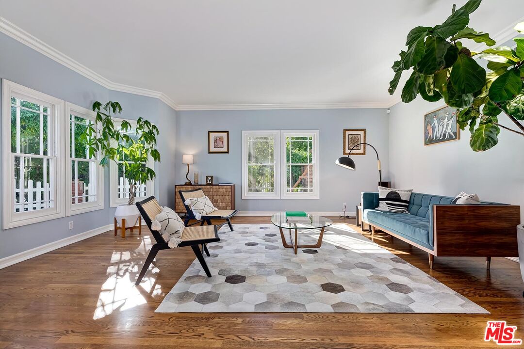 3827 Castle View Road Agoura Hills, CA 91301 - Photo 14 of 74 a living room with furniture and a potted plant