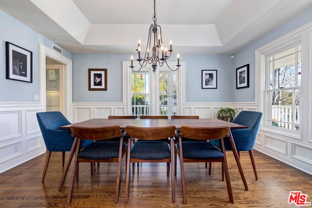 3827 Castle View Road Agoura Hills, CA 91301 - Photo 17 of 74 a view of a dining room with furniture window and wooden floor