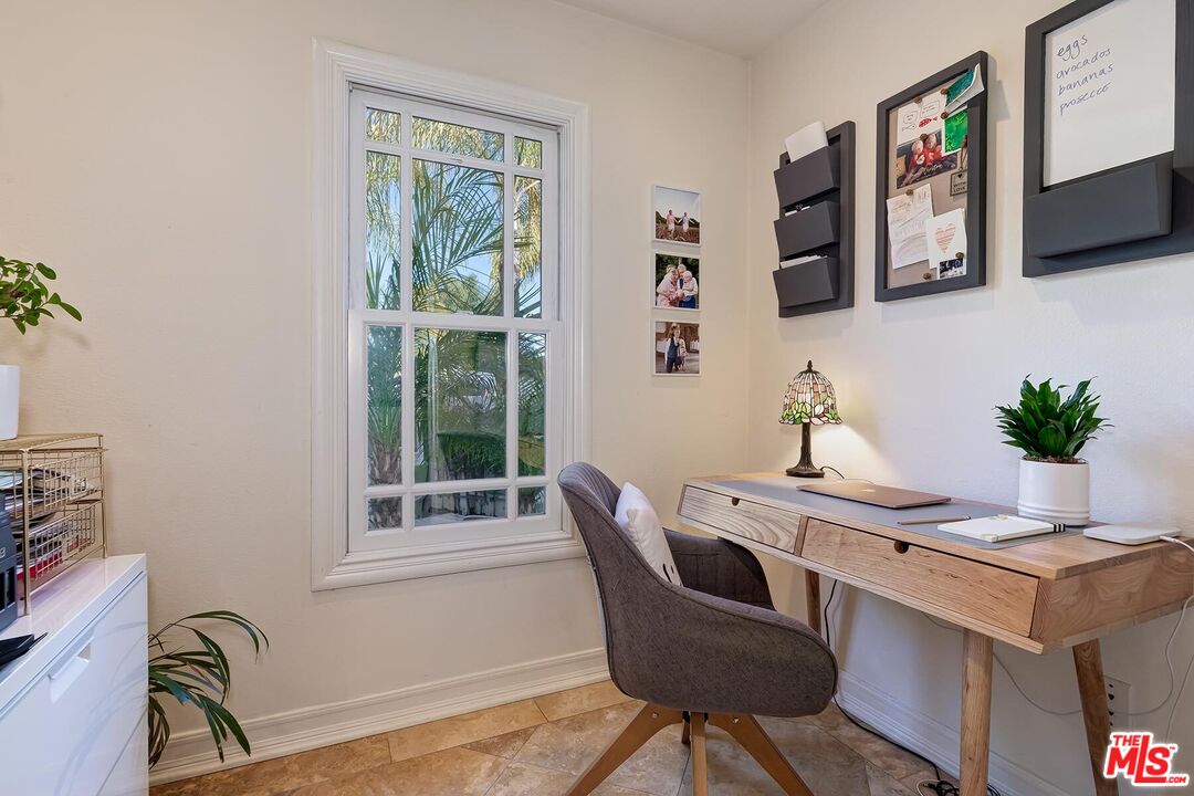 3827 Castle View Road Agoura Hills, CA 91301 - Photo 26 of 74 a view of a workspace with furniture and a window