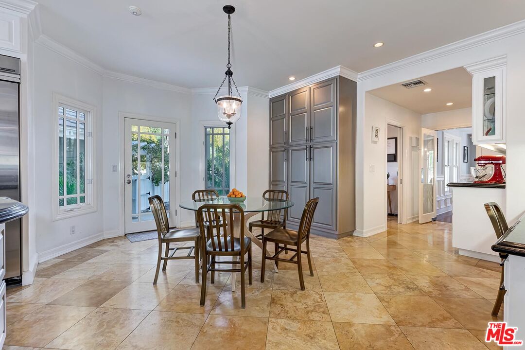 3827 Castle View Road Agoura Hills, CA 91301 - Photo 34 of 74 a view of a dining room with furniture and a chandelier