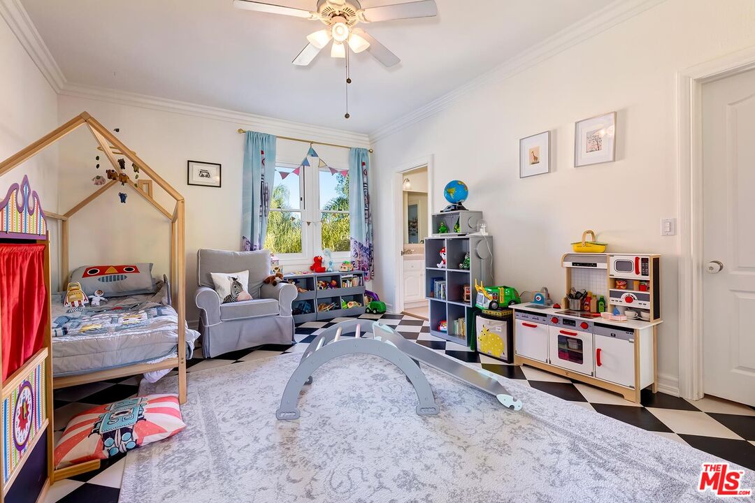 3827 Castle View Road Agoura Hills, CA 91301 - Photo 52 of 74 a living room with furniture and a window