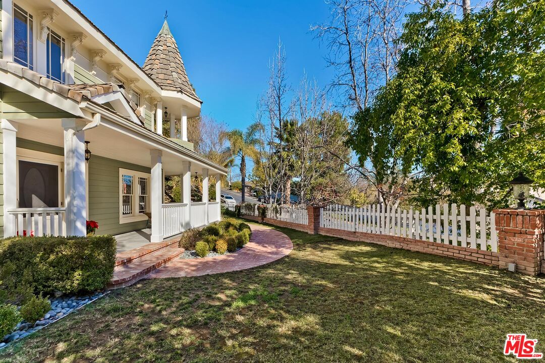 3827 Castle View Road Agoura Hills, CA 91301 - Photo 7 of 74 a view of a house with backyard and sitting area