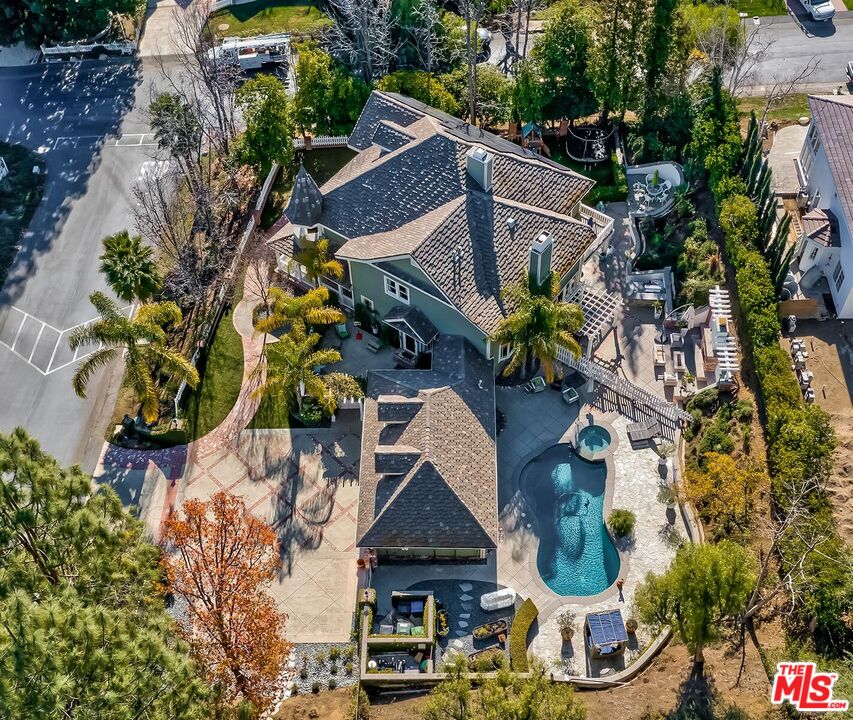 3827 Castle View Road Agoura Hills, CA 91301 - Photo 74 of 74 an aerial view of house with yard swimming pool and outdoor seating