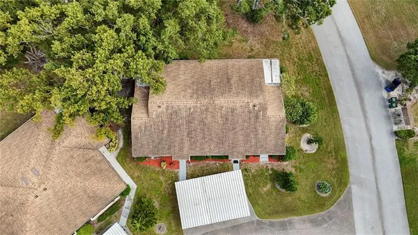 an aerial view of a swimming pool