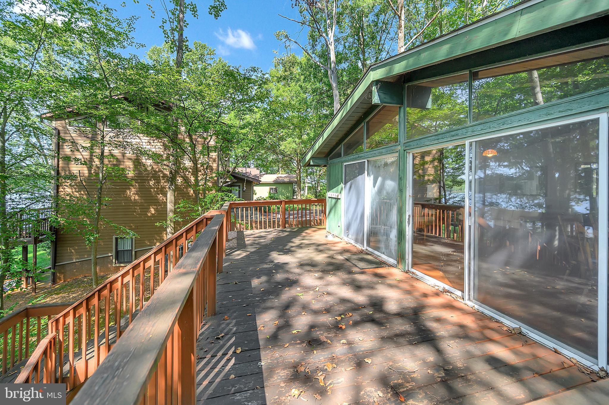 127 Greenspring Road Locust Grove, VA 22508 - Photo 10 of 39 Sliders open to expansive deck