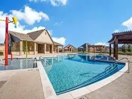 a view of a house with swimming pool