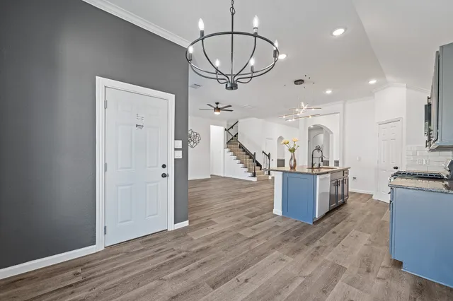 a view of a kitchen and dining room