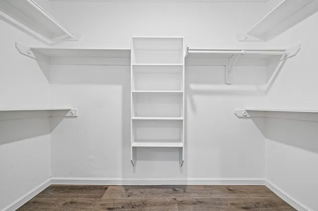 a view of an empty walk in closet