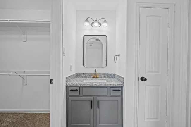 a view of a room with racks on the wall