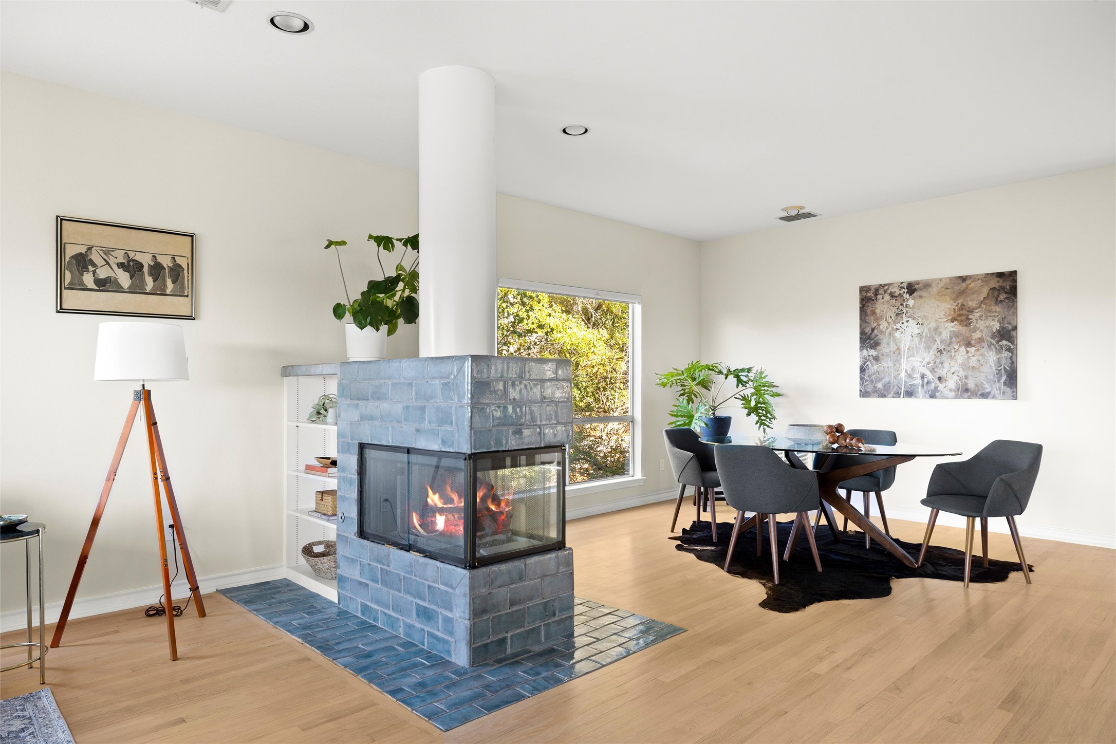 5926 Northwest Place Austin, TX 78731 - Photo 13 of 40 a living room with furniture a table and wooden floor