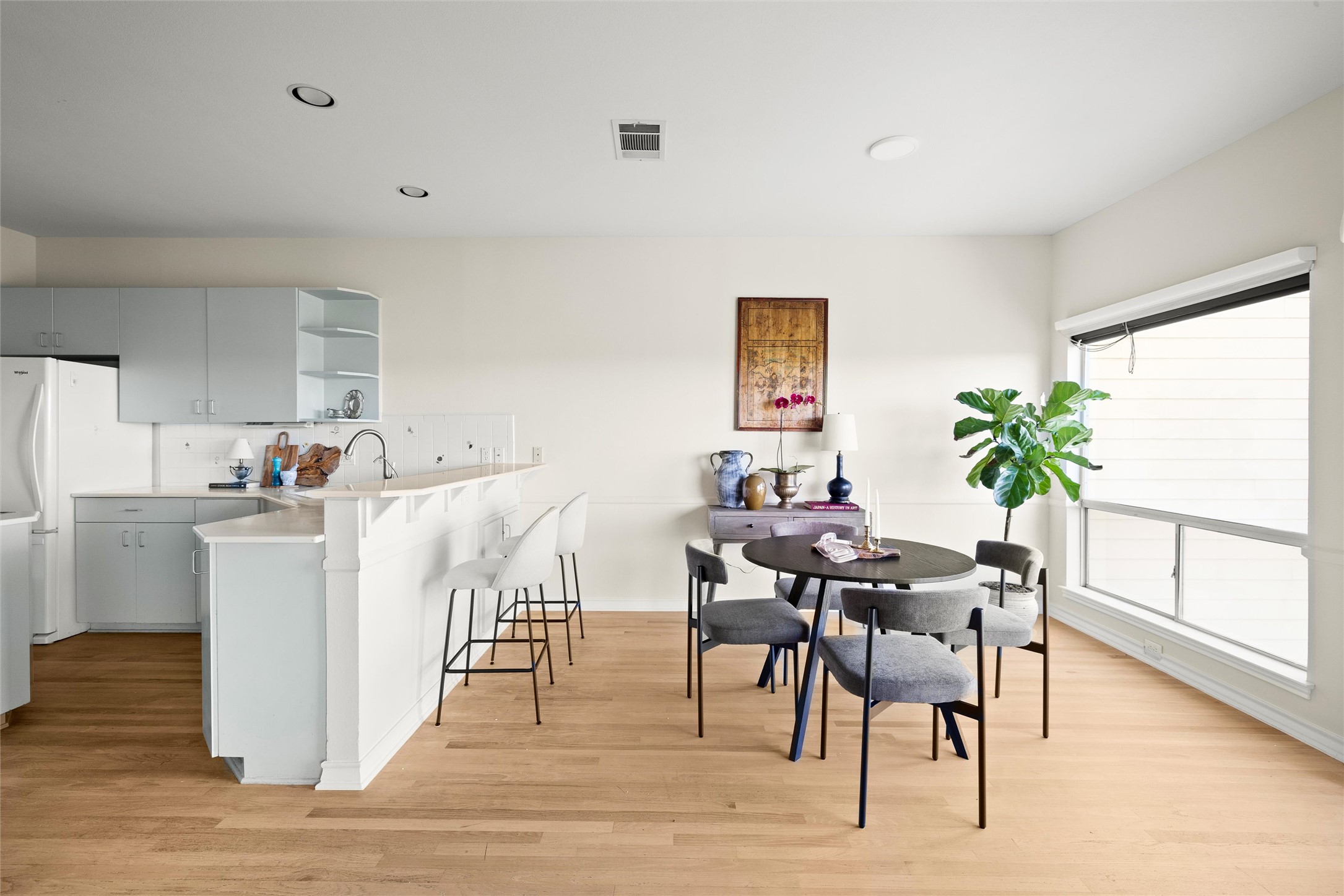 5926 Northwest Place Austin, TX 78731 - Photo 18 of 40 a view of kitchen with furniture and wooden floor