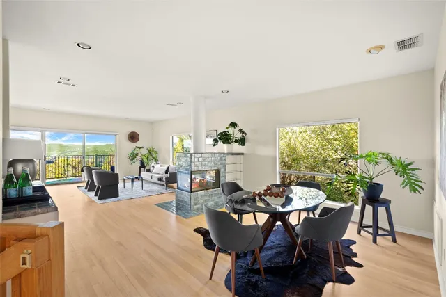 a view of a balcony with lake view and mountain view