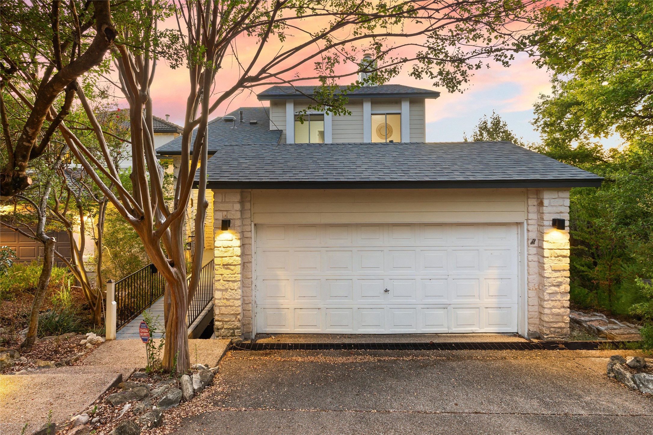 5926 Northwest Place Austin, TX 78731 - Photo 39 of 40 a front view of a house with a yard