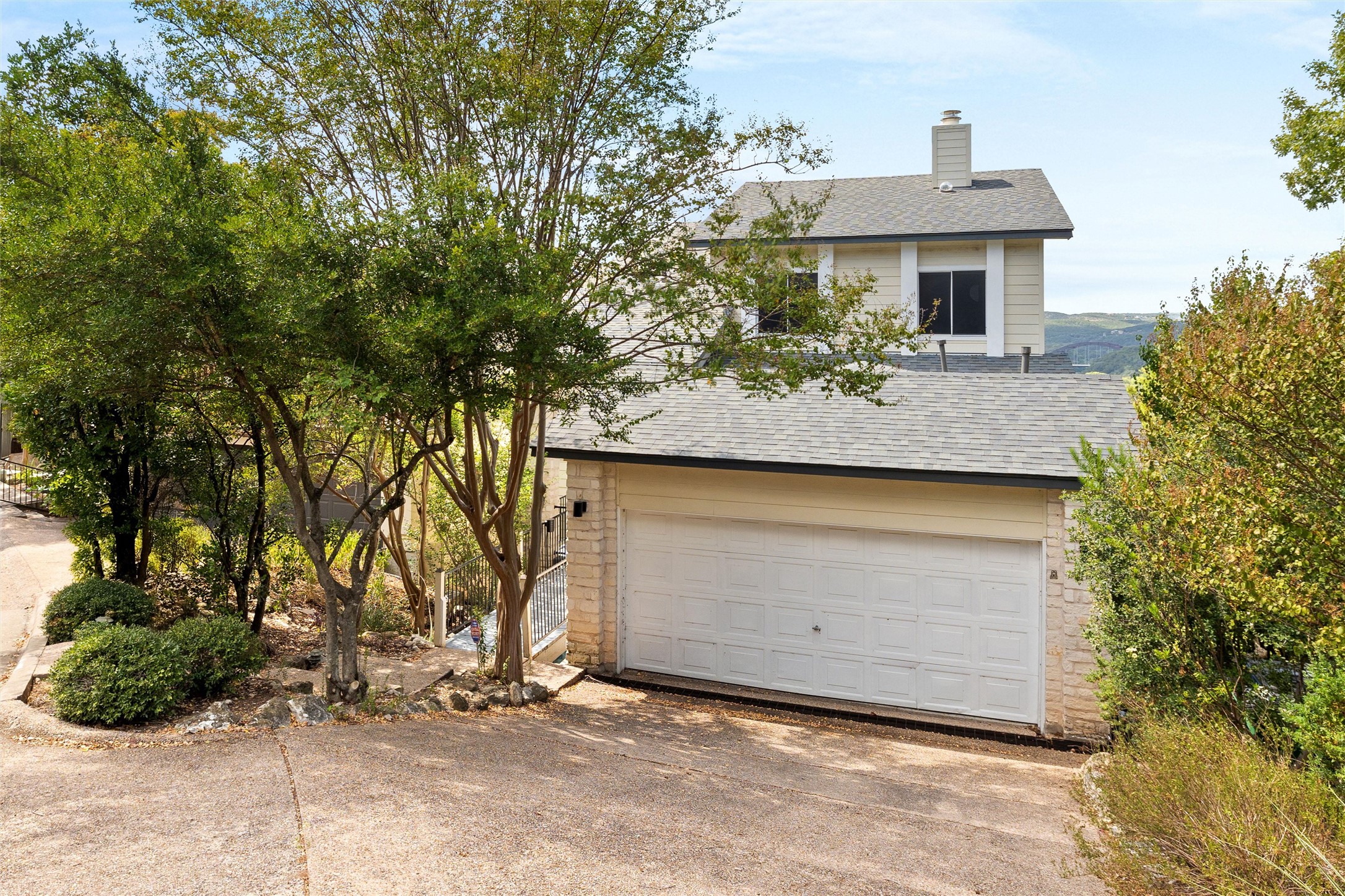 5926 Northwest Place Austin, TX 78731 - Photo 40 of 40 a front view of a house with garden