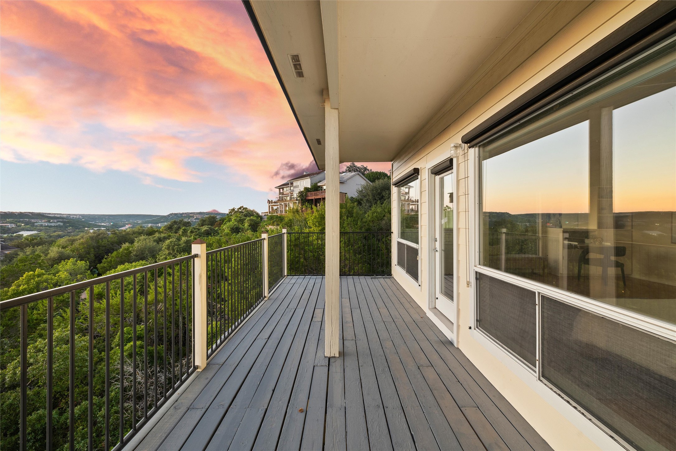 5926 Northwest Place Austin, TX 78731 - Photo 10 of 40 a view of a balcony with wooden floor