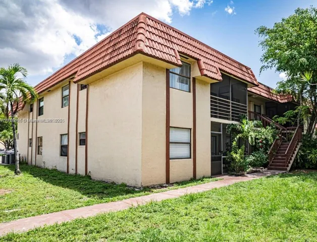 a front view of house with yard