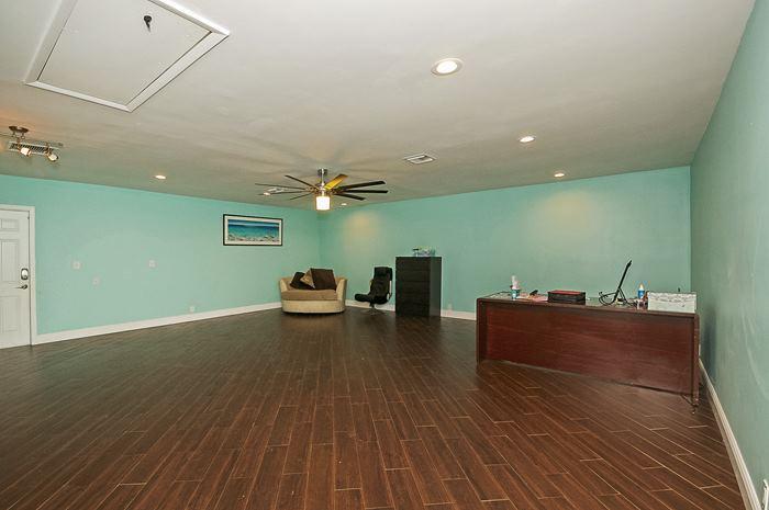 13387 Barwick Road Delray Beach, FL 33445 - Photo 11 of 28 a living room with furniture and a wooden floor