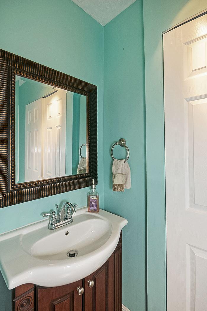 13387 Barwick Road Delray Beach, FL 33445 - Photo 12 of 28 a bathroom with a sink and a mirror