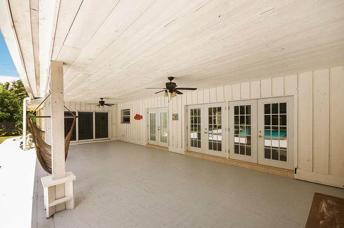 13387 Barwick Road Delray Beach, FL 33445 - Photo 23 of 28 an empty room with windows