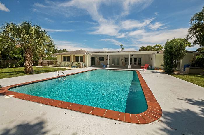 13387 Barwick Road Delray Beach, FL 33445 - Photo 27 of 28 a view of a house with a yard
